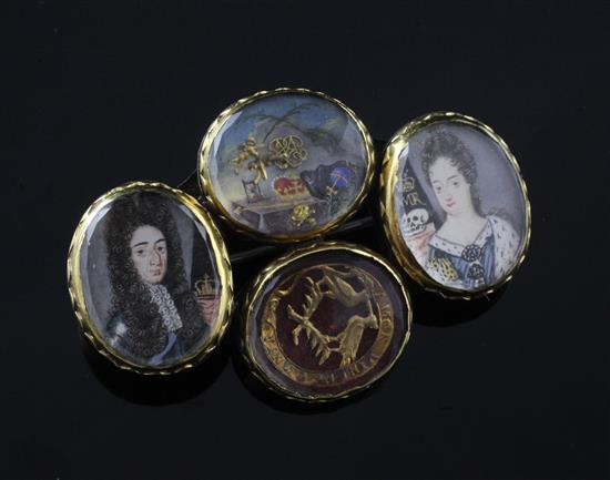 Four late 17th century gold mounted Stuart crystal oval slides later mounted together as a brooch, width 54mm.